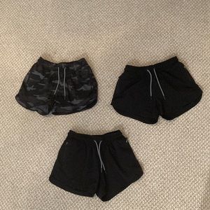 3 pairs of lightly worn athleta girl shorts size large!!!!